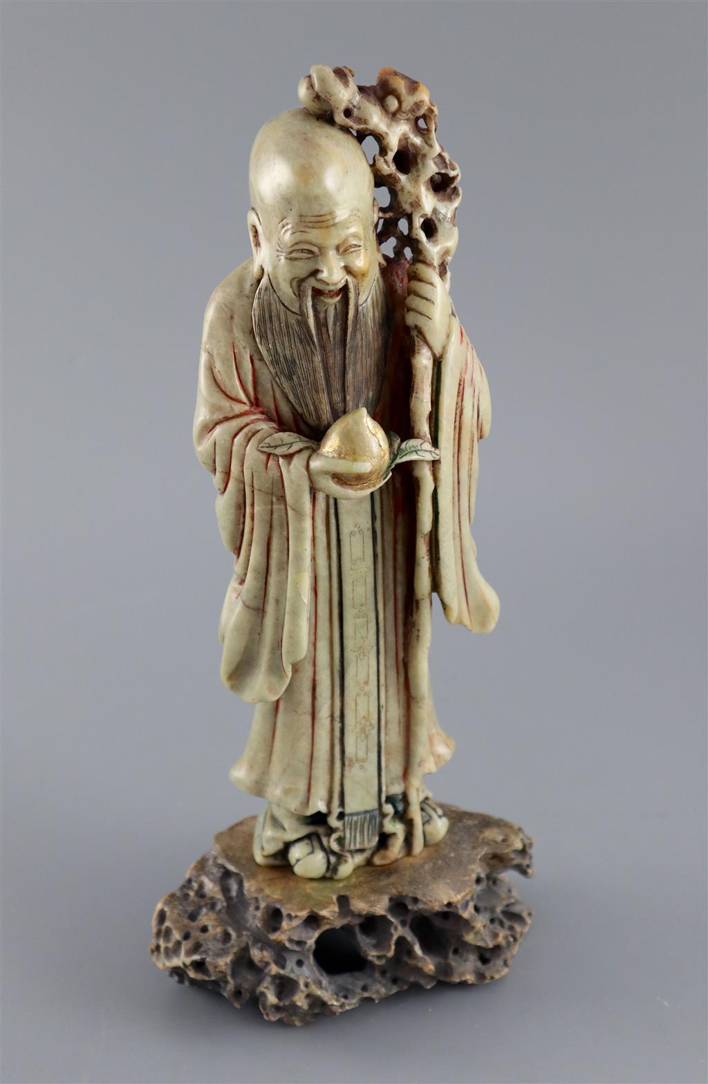 A Chinese soapstone figure of Shou Lao, 18th century, 28.5cm high